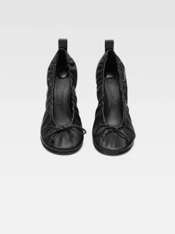 De ballerina's met dubbele hak