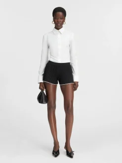 De gebreide shorts met plooien